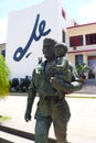 Statue of Che Guevara with child and the writing Che in the background in Santa Clara, Cuba