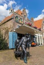 Statue of cheese carriers at the cheese market in Edam