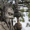 Statue of a Chinese warrior near an entrance of Wat Pho. Wat Pho is a Buddhist temple complex in the Rattanakosin district of Ban