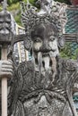 Statue of a Chinese warrior near an entrance of Wat Pho. Wat Pho is a Buddhist temple complex in the Rattanakosin district of Ban