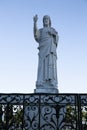 Statue of Christ in Notre Dame de la Garde in Marseille against a bright blue sky on a sunny day. Royalty Free Stock Photo