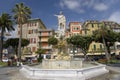 Statue of Christopher Columbus in town center and fountain in Santa Margarita, the Italian Riviera, Italy, Europe