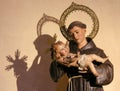 Saint Anthony of Padua holding Baby Jesus Royalty Free Stock Photo