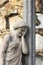 Statue of a classical woman regretting the loss of a beloved one Royalty Free Stock Photo