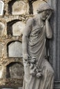 Statue of a classical woman regretting the loss of a beloved one Royalty Free Stock Photo