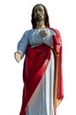 statue in color of Jesus to his full height on a white background. Isolate the Son of God. Jesus stands holding his left hand on Royalty Free Stock Photo