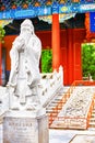 Statue of Confucius, the great Chinese philosopher in Temple of Royalty Free Stock Photo