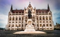 Statue of Count Gyula Andrassy and Hungarian Parliament building Royalty Free Stock Photo