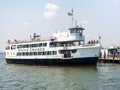 Statue cruises boat docked at Liberty Island in New York