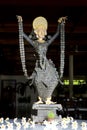 Statue of dancer of coins