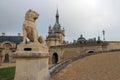 statue of a dog and castle in chantilly - france Royalty Free Stock Photo