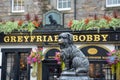 Statue of the dog Greyfriars Bobby in front of the pub in Edinburgh