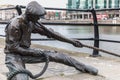 Statue by Dony MacManus of The Linesman in Dublin Royalty Free Stock Photo