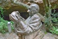 Statue of Dr Robert Broom looking at 2.8 million year old skull of Mrs. Ples at the Cradle of Humankind, a World Heritage Site in Royalty Free Stock Photo