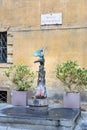 Statue Eagle Contrade Aquila on the Piazza di Postierla in Siena. Italy