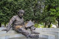 Statue of Einstein reading a book Royalty Free Stock Photo