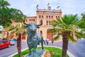 The statue of El Toro and bullring of El Puerto, Spain