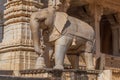 Statue of elephant with bell in old temple