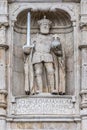 Statue of Emperor Charles V in the facade of the Gateway of Santa Maria (Arco de Santa Maria).