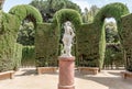 Statue of Eros in the center of Labyrinth Park of Horta in Barcelona