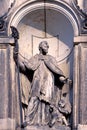 Statue Evangelist Matthew than in one of the niches of medieval cathedral in Dresden, Saxony, Germany