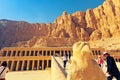 Statue of falcon bird Horus guards the entrance on the balustrade to the mortuary temple of Hatshepsut in Egypt