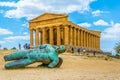 Statue of fallen Icaro in front of the Concordia temple in the Valley of temples near Agrigento in Sicily, Italy Royalty Free Stock Photo