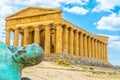 Statue of fallen Icaro in front of the Concordia temple in the Valley of temples near Agrigento in Sicily, Italy Royalty Free Stock Photo