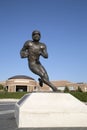 Statue of famous football player in front of university building