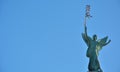 Statue of an female angel holding a strange neon light Royalty Free Stock Photo