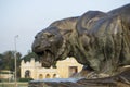 A statue of a ferocious tiger made of bronze