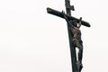 statue figure of christ crucified on the cross of a temple Royalty Free Stock Photo