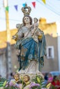 statue of the figure of the saint of our lady of the good trip parading on top of a litter in Malpica do Tejo
