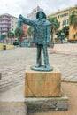 Statue of a fisherman in the port of Savona, Liguria, Italy