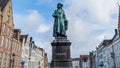 Statue of the Flemish painter Jan van Eyck in Bruges.