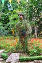 Statue of flowers in shape of warrior in park