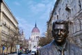 Statue of the former U.S. President Ronald Reagan on the background of Hungarian Parliament Building. Royalty Free Stock Photo