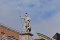 Statue of fortitude on top of a Gate to Dublin castle