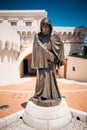 Statue of Francois Grimaldi disguised as a monk with a sword und