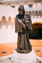 Statue of Francois Grimaldi disguised as a monk with a sword und