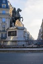 Statue of the French King Louis XIV (14th) in the center of Victories Place in Paris under a pure cold blue sky Royalty Free Stock Photo