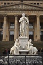 Statue in front of the Berlin Konzerthaus in Mitte on a cloudy day Berlin Germany