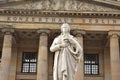 Statue in front of the Berlin Konzerthaus in Mitte on a cloudy day Berlin Germany