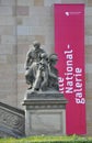 Statue front stairs of Alte National Galerie from Berlin in Germany