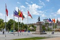 statue of General Rapp at Rapp square with flags of the contries of the european union in Colmar, France