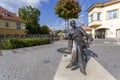 Statue of Geza Gardonyi in Eger, Hungary with the castle of Eger in the background