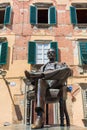 Statue of Giacomo Puccini in front of his birthplace in Lucca, Italy