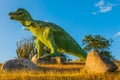 Statue of a giant green dinosaur. Prehistoric animal models, sculptures in the valley Of the national Park in Baconao, Cuba.