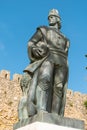 Statue of Gil Eanes next to the wall of the castle of Lagos, Algarve, Portugal