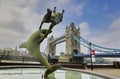 Statue Girl with Dolphin of Tower Bridge. London